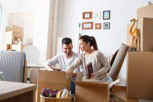 First Time Homeowner Insurance - Couple Unpacking House